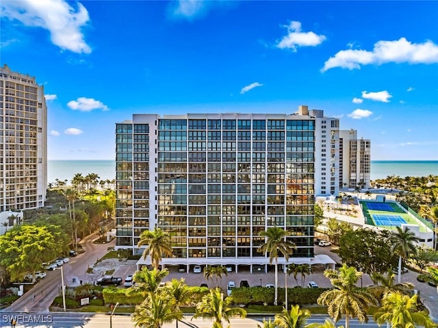 view of building exterior with a water view