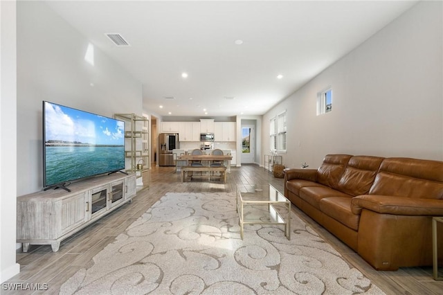 living room featuring light wood-type flooring