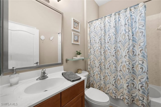 full bathroom with vanity, toilet, and shower / tub combo with curtain