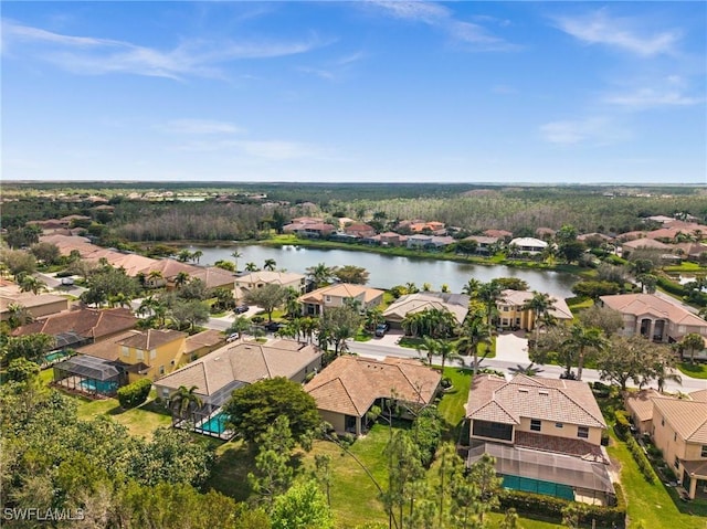 drone / aerial view featuring a water view