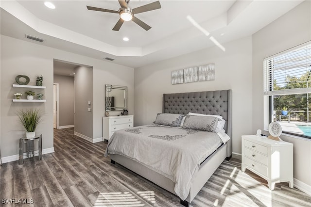 4641 Azalea Dr, Naples, FL 34119 - bedroom featuring a tray ceiling, baseboards, and visible vents