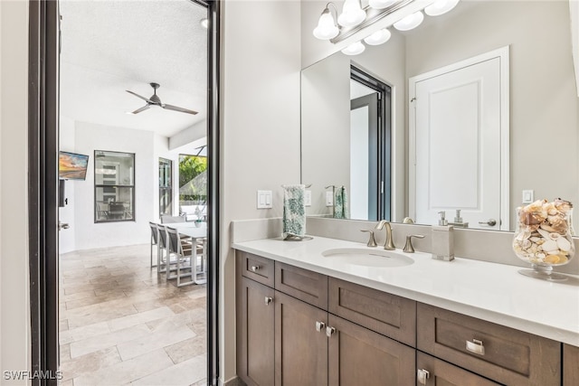 4641 Azalea Dr, Naples, FL 34119 - bathroom featuring a ceiling fan and vanity
