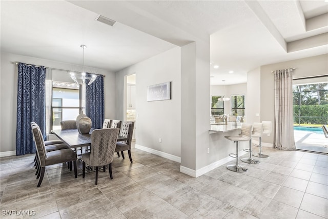 4641 Azalea Dr, Naples, FL 34119 - dining room featuring plenty of natural light, baseboards, light tile patterned flooring, and visible vents