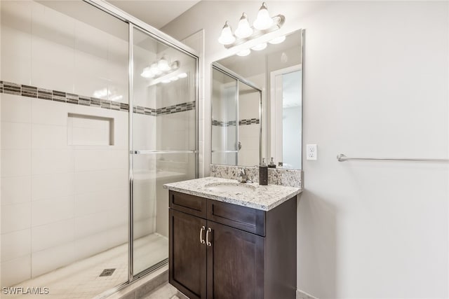 4641 Azalea Dr, Naples, FL 34119 - bathroom featuring a stall shower and vanity