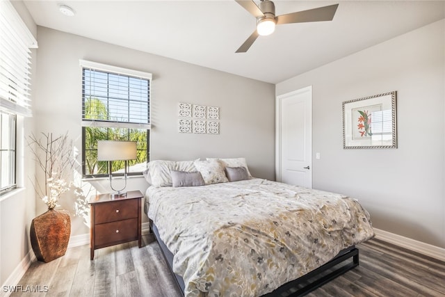 4641 Azalea Dr, Naples, FL 34119 - bedroom featuring baseboards, wood finished floors, and a ceiling fan