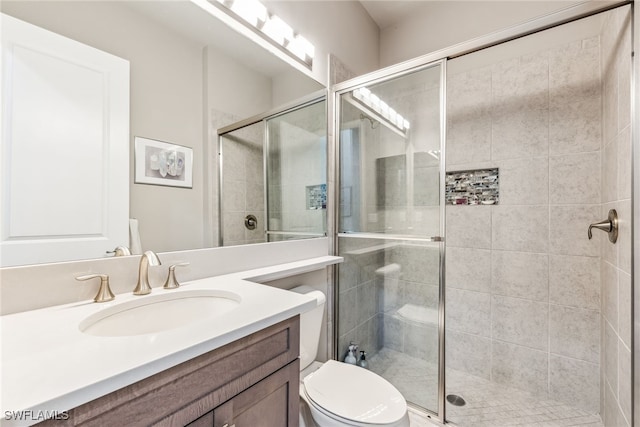 4641 Azalea Dr, Naples, FL 34119 - bathroom featuring vanity, toilet, and a shower stall