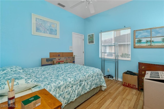 bedroom with ceiling fan and light wood-type flooring