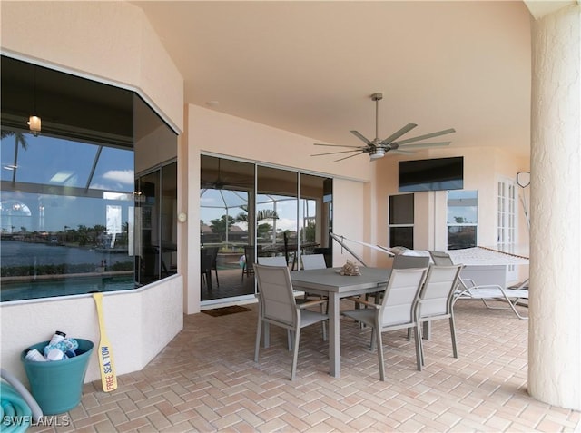 view of patio / terrace featuring ceiling fan