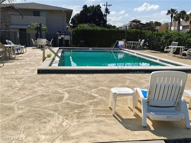 view of pool featuring a gazebo and a patio