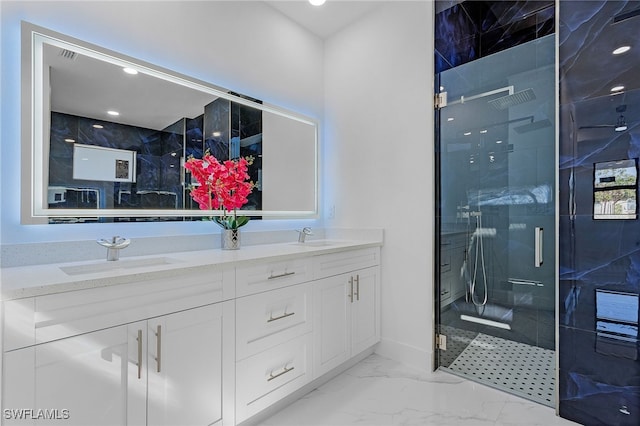 bathroom featuring vanity and walk in shower