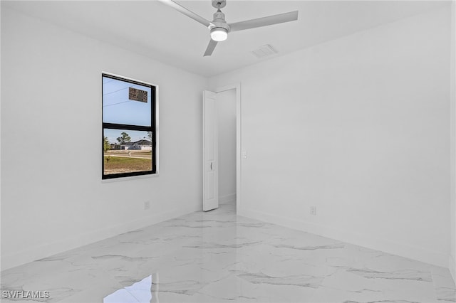 empty room featuring ceiling fan