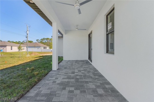 view of patio with ceiling fan