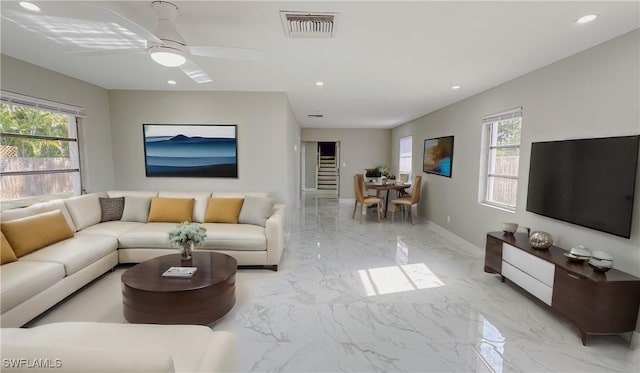 living room with ceiling fan