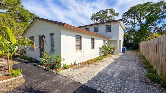 view of property exterior with a garage