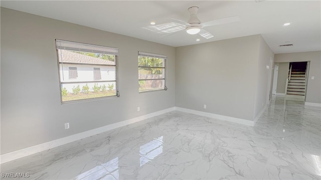 empty room featuring ceiling fan