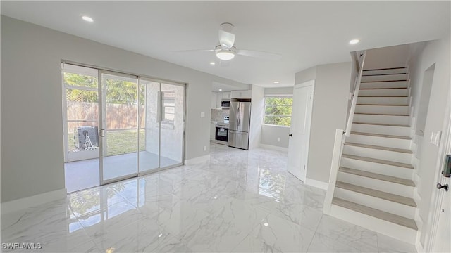 interior space featuring ceiling fan