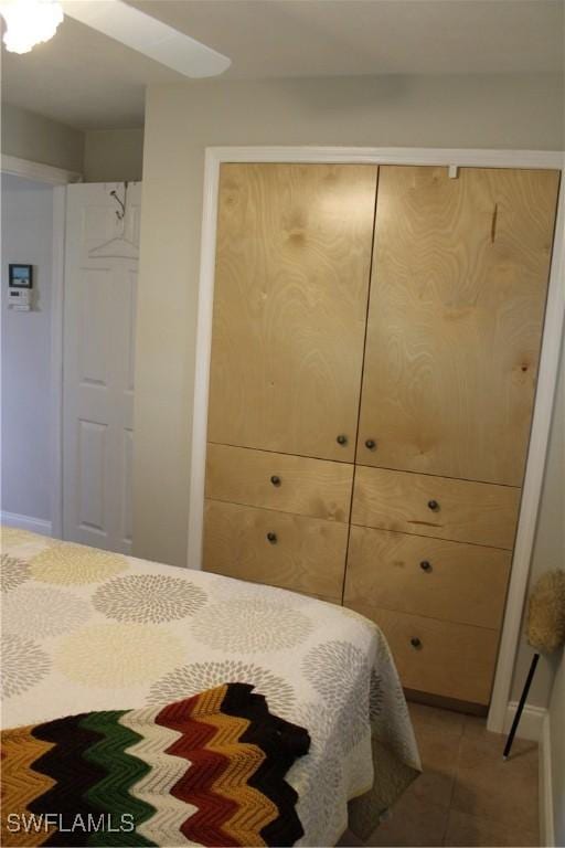 bedroom featuring light tile patterned flooring