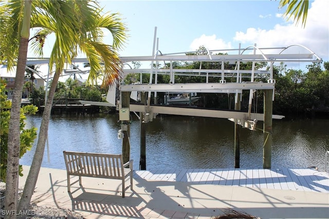 dock area with a water view