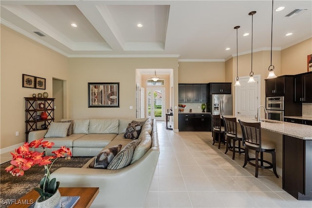 living room featuring beamed ceiling, ornamental molding, a towering ceiling, and light tile patterned floors