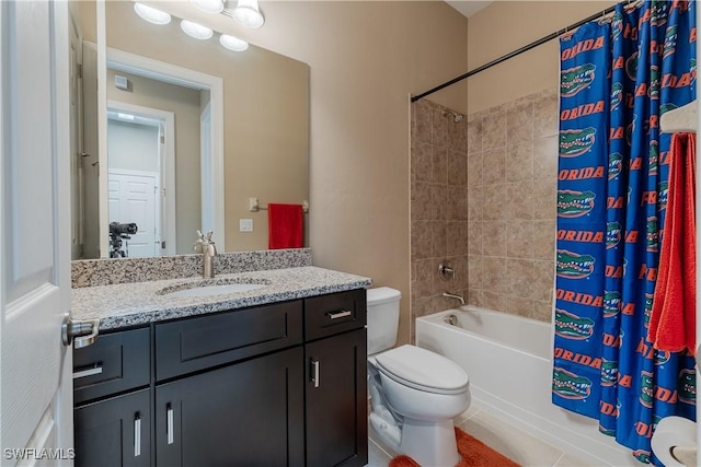 full bathroom with toilet, vanity, and shower / bath combo with shower curtain