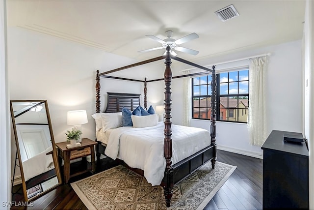 bedroom featuring dark wood-type flooring and ceiling fan