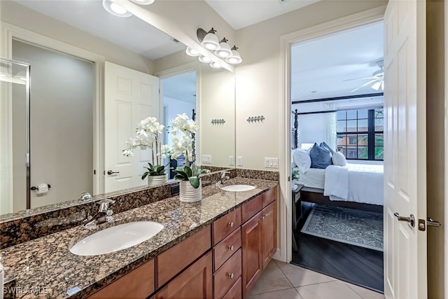 bathroom with ceiling fan, vanity, and tile patterned flooring