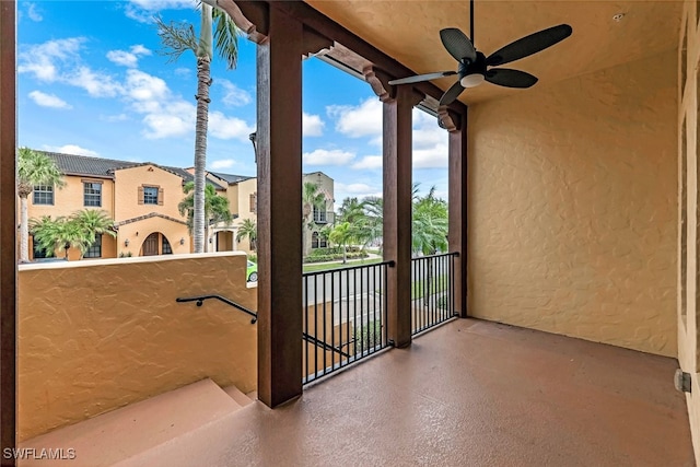 balcony featuring ceiling fan