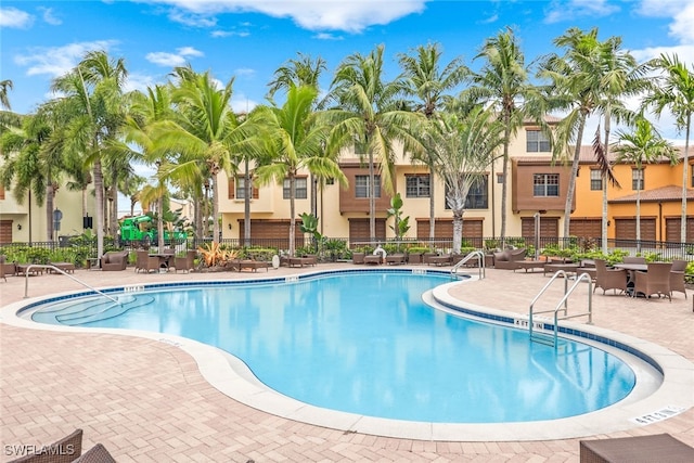 view of swimming pool with a patio