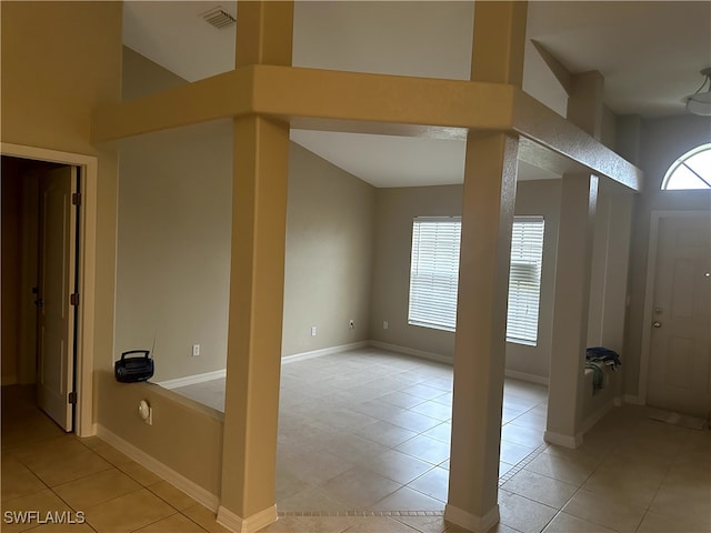 tiled foyer entrance featuring plenty of natural light