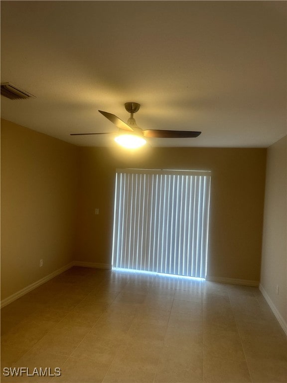 unfurnished room featuring ceiling fan