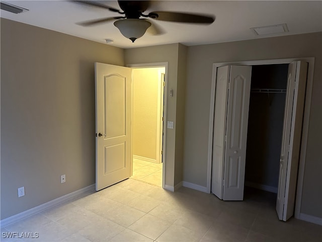 unfurnished bedroom featuring a ceiling fan, a closet, visible vents, and baseboards