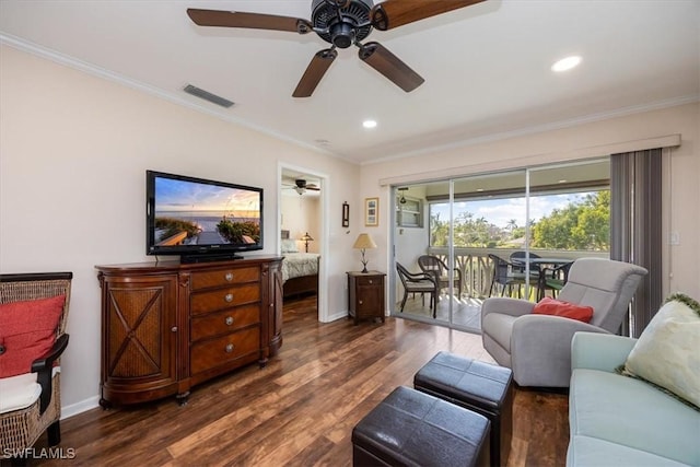 living room featuring dark wood-type flooring and ornamental molding