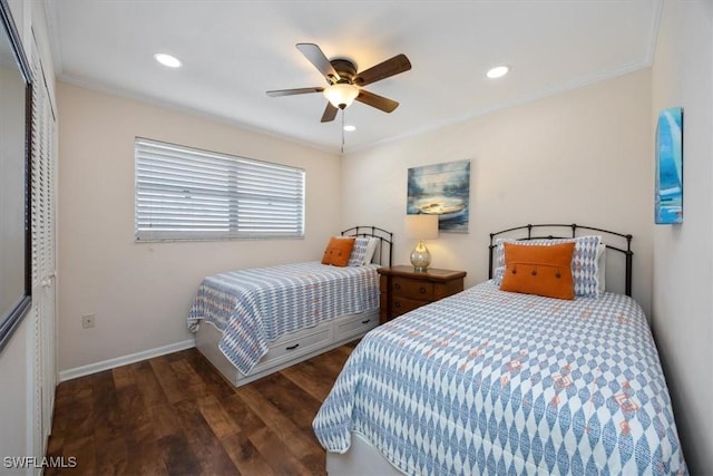 bedroom with ornamental molding, dark hardwood / wood-style floors, and ceiling fan