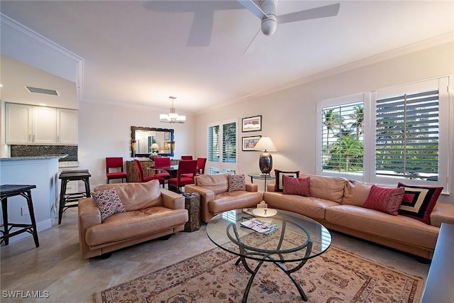 8473 Bay Colony Dr Unit 203, Naples, FL 34108 - living room with ceiling fan with notable chandelier and crown molding