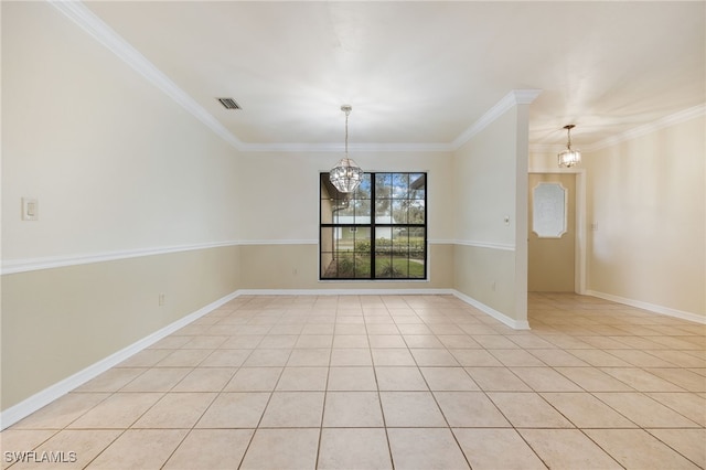 spare room with crown molding, light tile patterned floors, and a notable chandelier