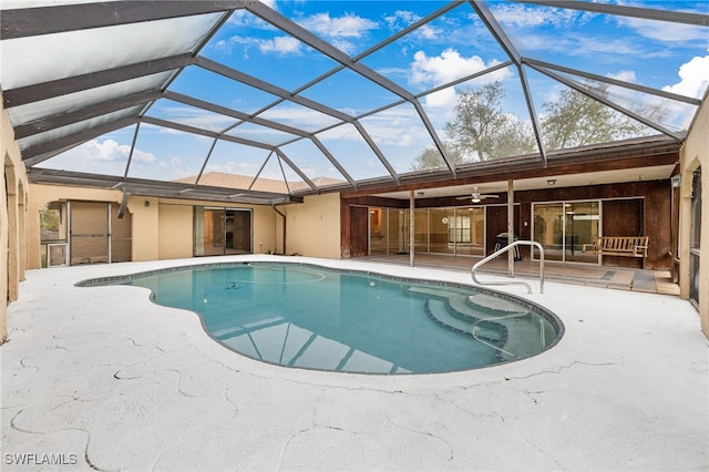 view of pool featuring a lanai and a patio