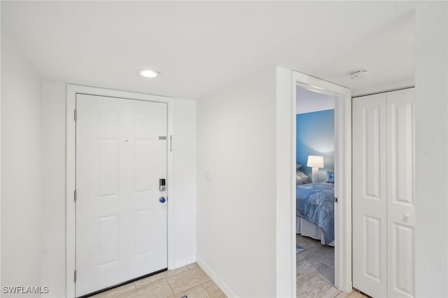 15400 River Vista Dr Unit 301, North Fort Myers, FL 33917 - foyer entrance featuring baseboards and recessed lighting