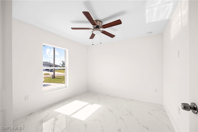 unfurnished room featuring ceiling fan