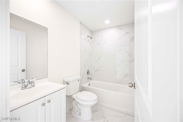 full bathroom featuring vanity, toilet, and tiled shower / bath