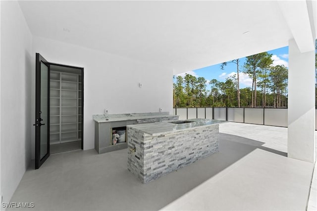 view of patio with an outdoor kitchen
