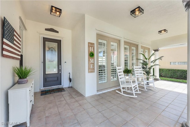 entrance to property with covered porch