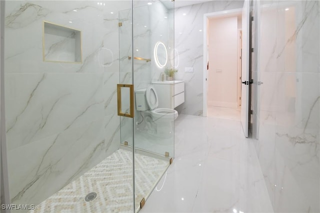 bathroom with vanity, an enclosed shower, and toilet