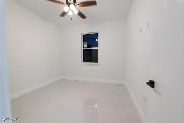 spare room featuring ceiling fan