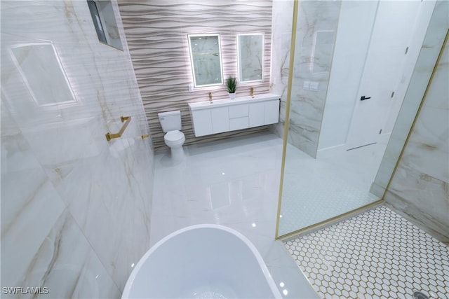 bathroom featuring tile patterned flooring, vanity, separate shower and tub, and tile walls