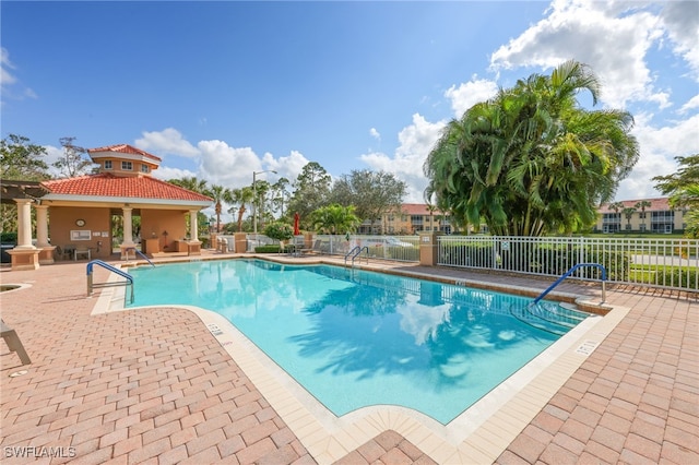 view of pool featuring a patio