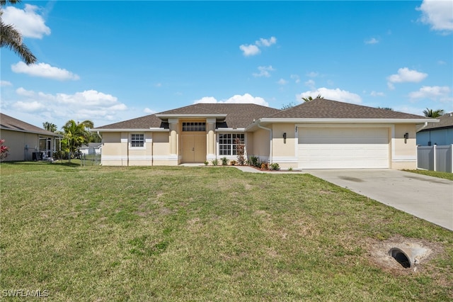 view of front of home with a garage and a front yard