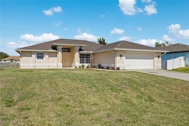 view of front facade featuring a garage and a front lawn