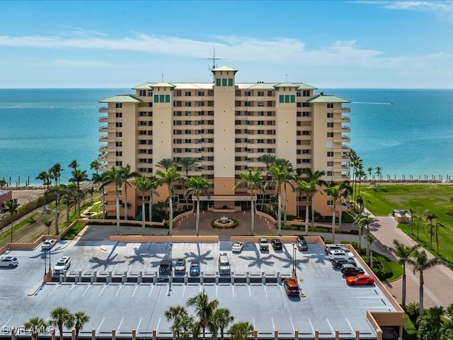 view of building exterior with a water view