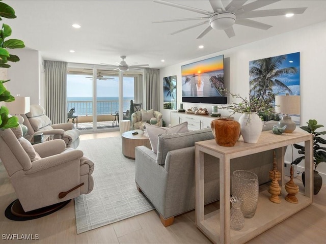 living room featuring ceiling fan