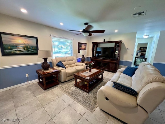 tiled living room featuring ceiling fan